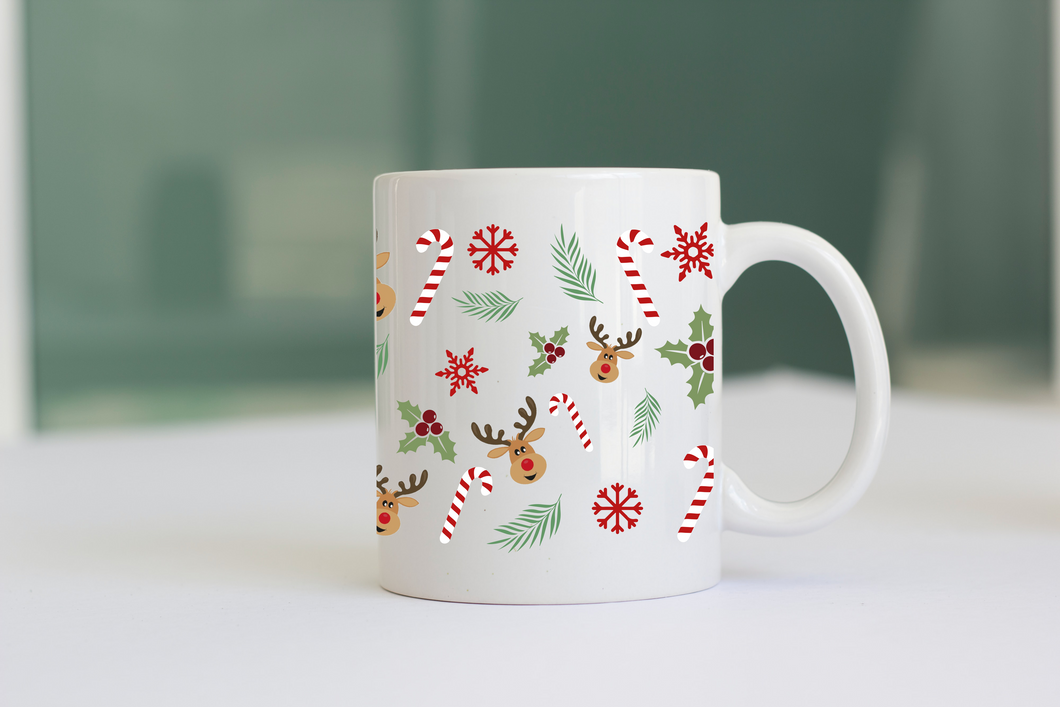Taza renos y bastones de caramelo